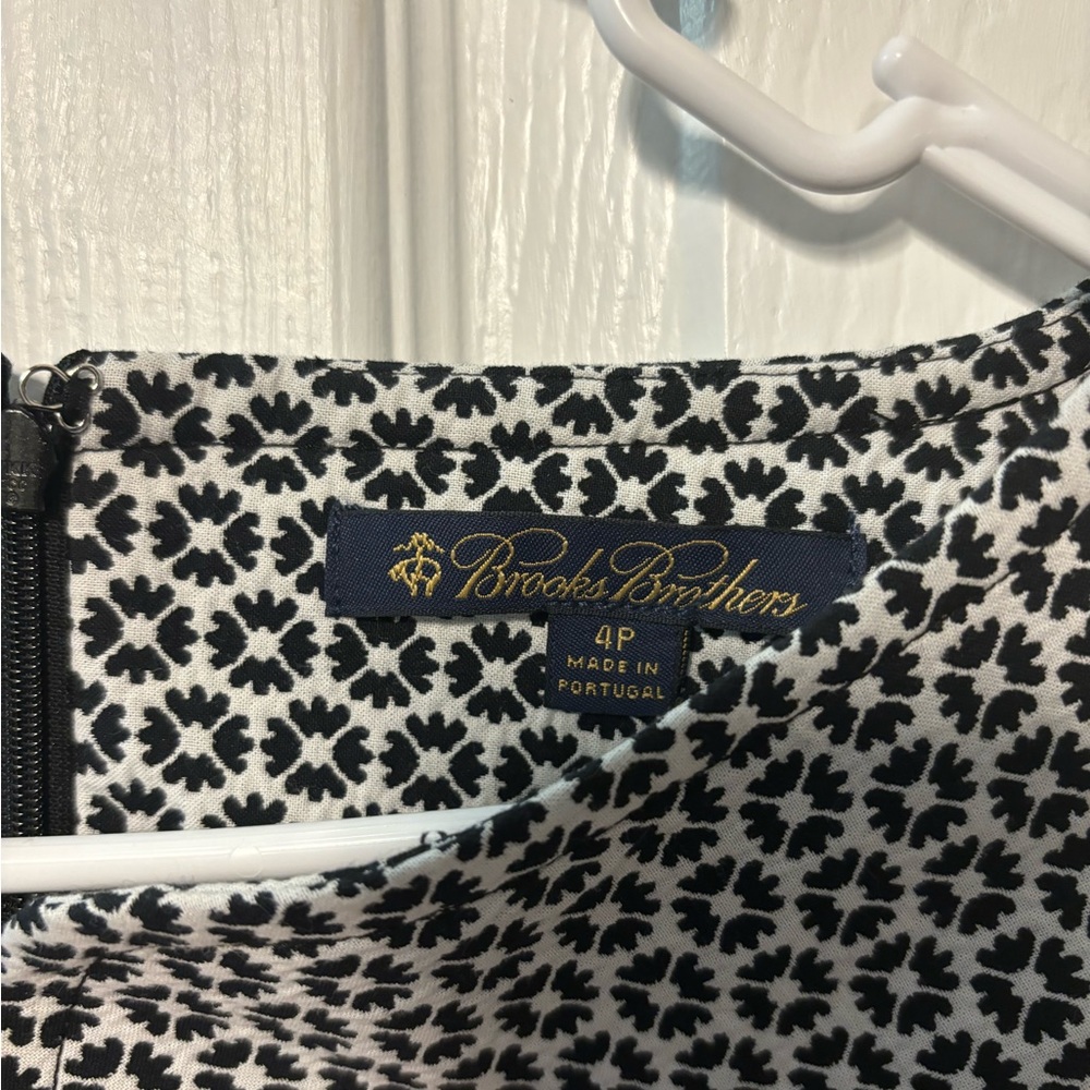 Add style to your wardrobe with this Brooks Brothers sheath dress. NWT! 4P